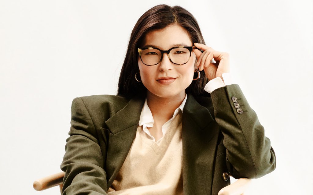 Image of a woman wearing glasses and looking into the camera