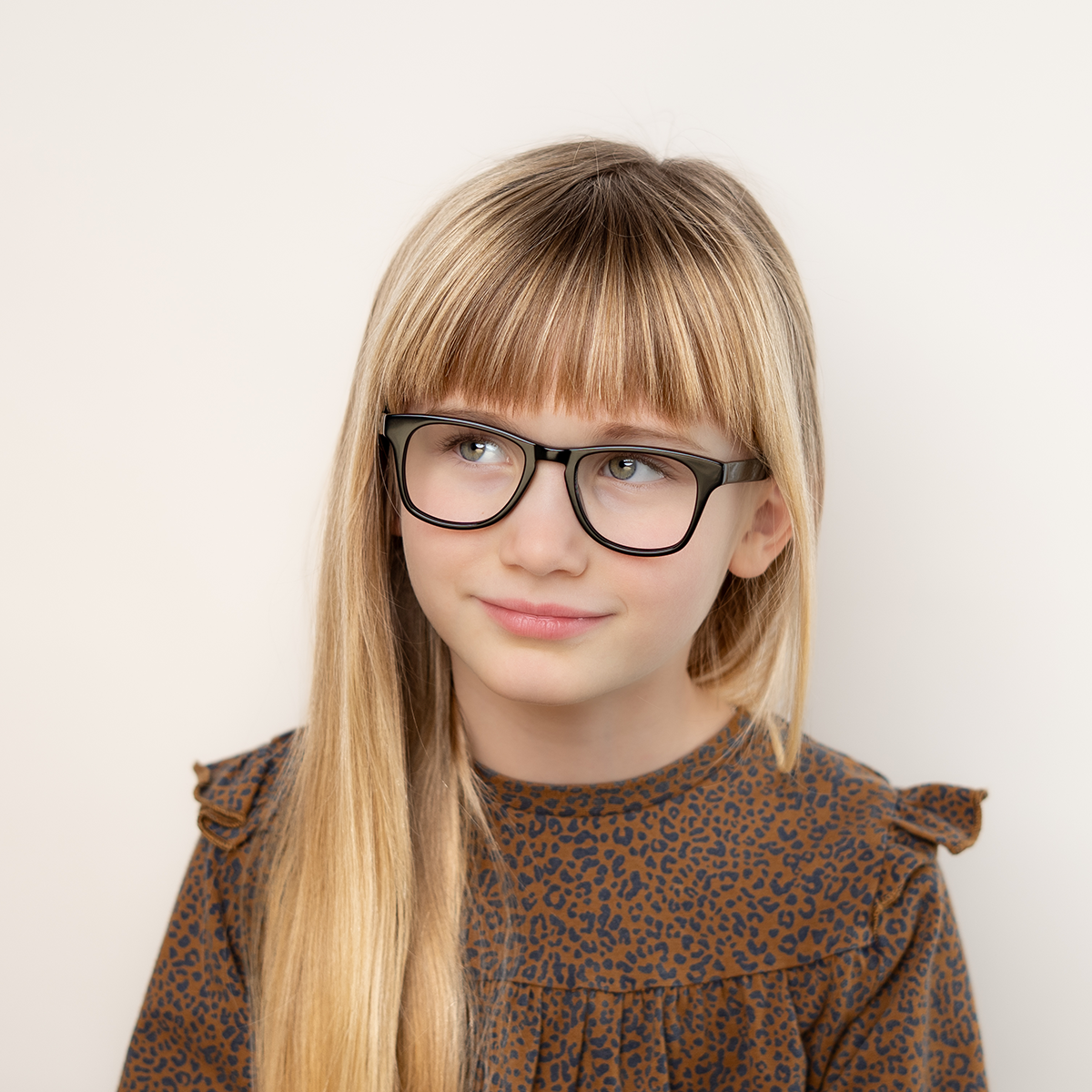 Girl wearing black glasses