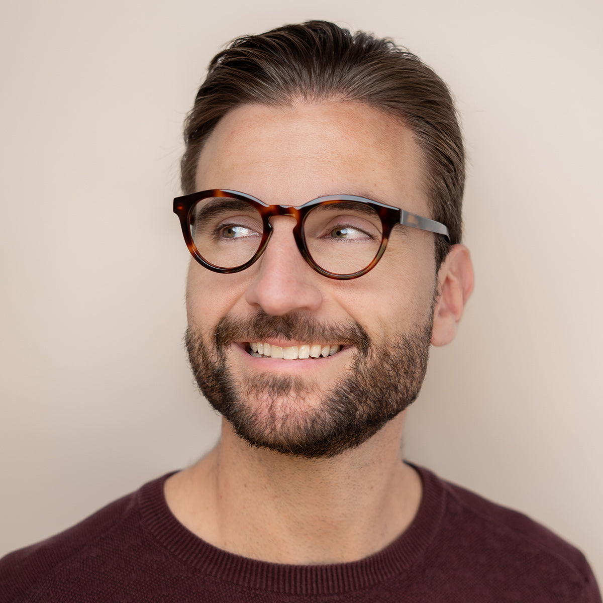 Man smiling wearing glasses